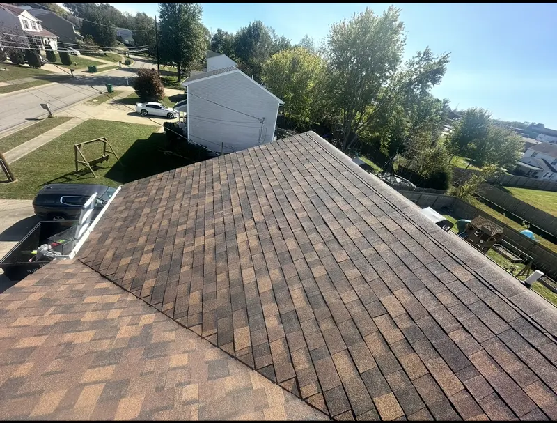 Aerial view of a new architectural shingle roof in Elizabethtown, KY installed by RenovateX LLC
